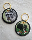 Scrappy Raccoon Double-Sided Keychain-Stay Home Club-Strange Ways